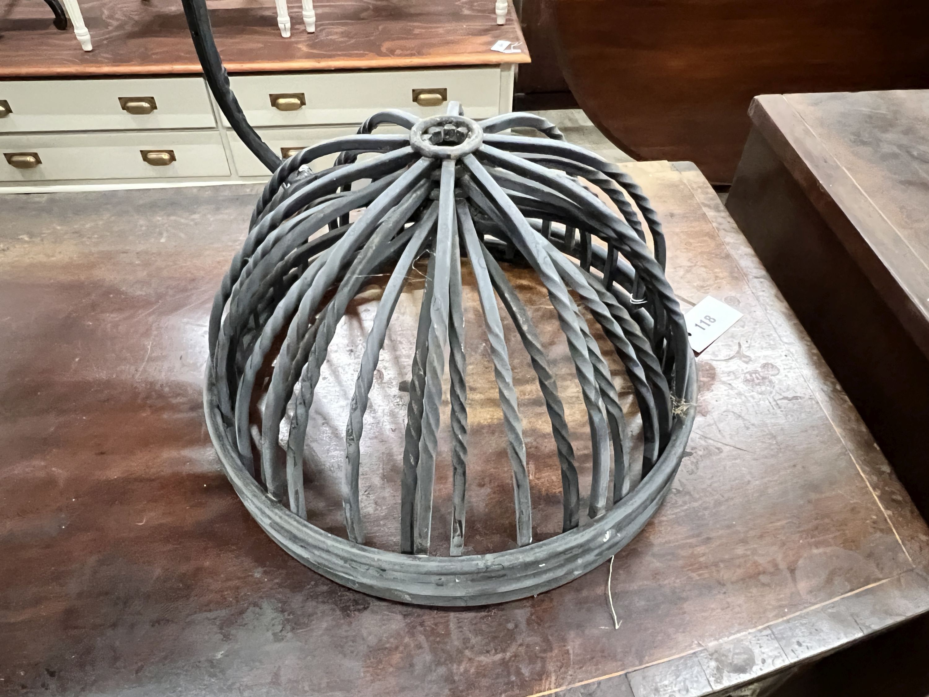 A circular aluminium low garden table, diameter 63cm, height 43cm together with four planter frames